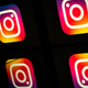 A photo illustration shows four Instagram icons against a black background.
